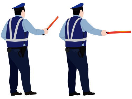 赤い信号灯をもって注意する様子