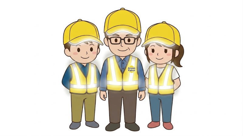 おそろいのベストと帽子を着ている3人